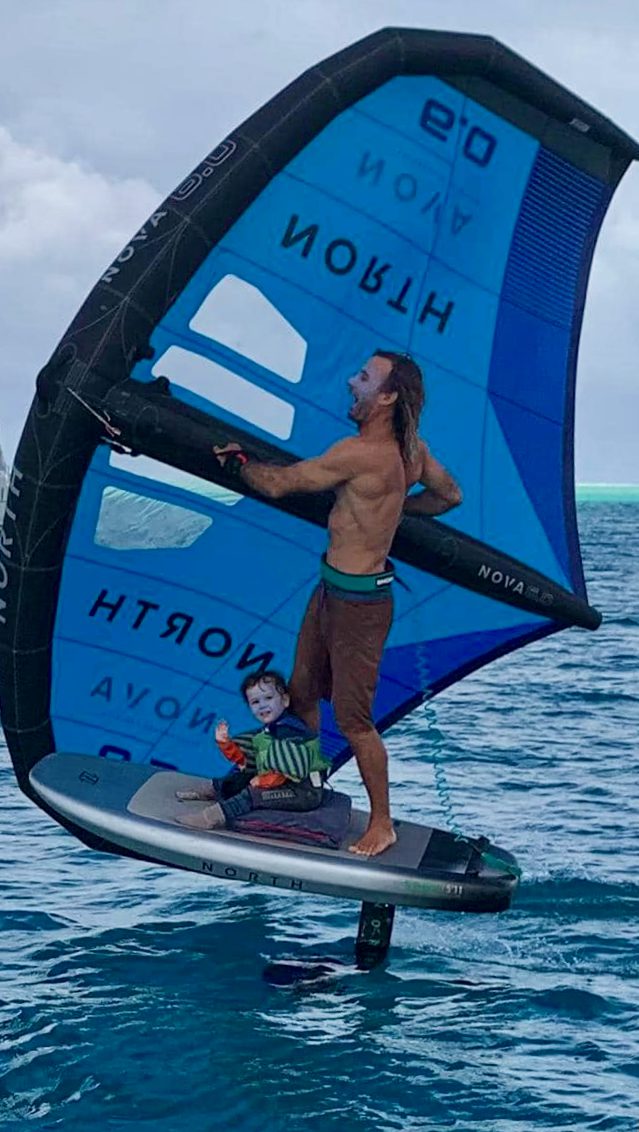 Adrien foiling with his daughter